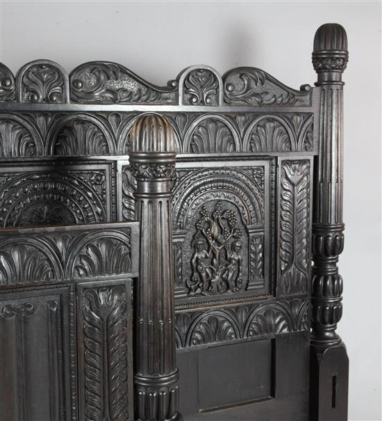 A 17th century style ebonised oak bedstead, W.6ft 10in. D.7ft 4in. H.4ft approx.